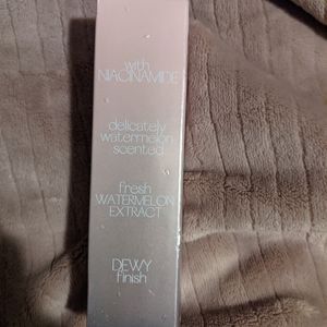 With Nacimade watermelon dewy finish spray